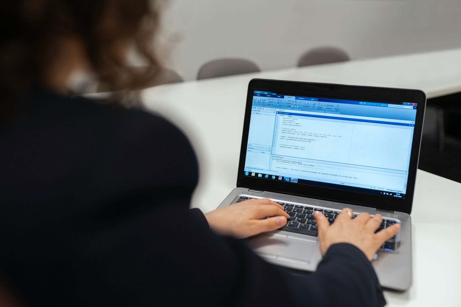 Developer building features for a custom web application